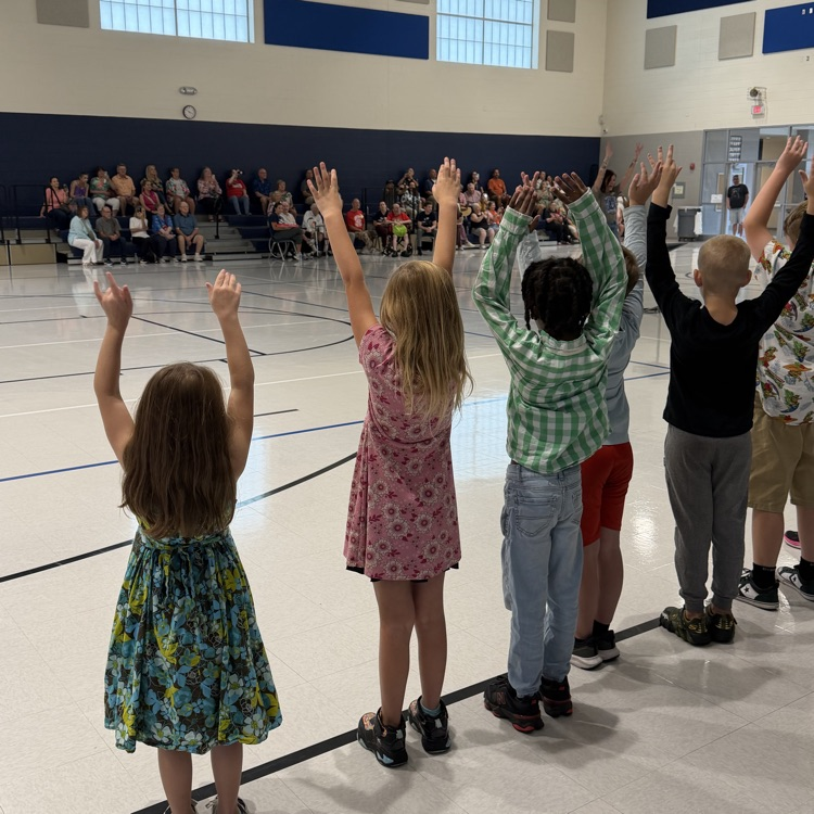 Second grade students performing 