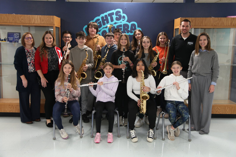 St. Louis Music donated nearly $12,000 in band instruments to the Woodridge Middle School Band program.