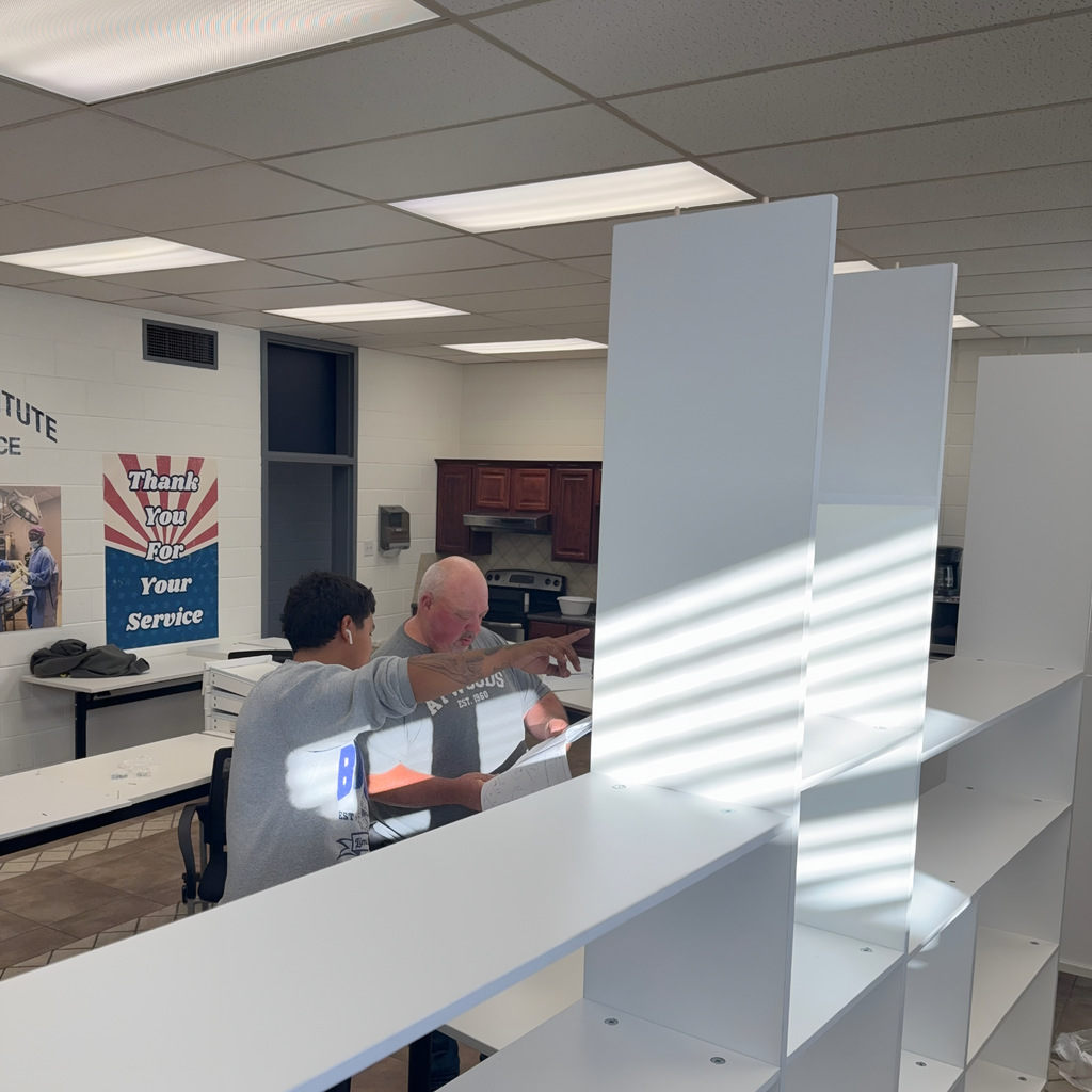 Lupe & Jeff putting a complicated desk