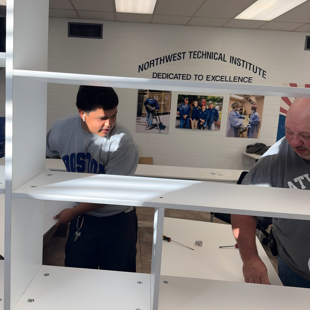 Lupe & Jeff putting a complicated desk