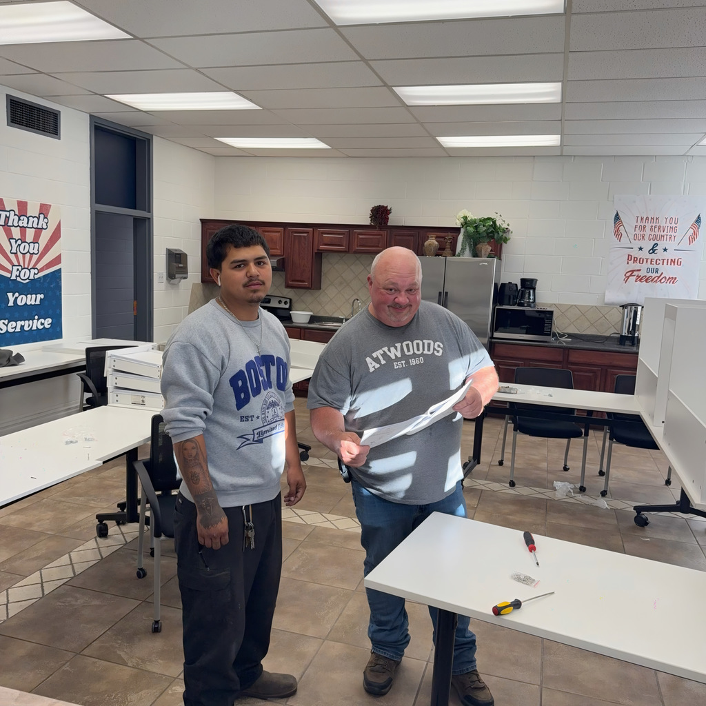 Lupe & Jeff putting a complicated desk