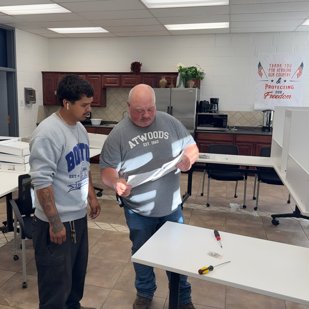 Lupe & Jeff putting a complicated desk