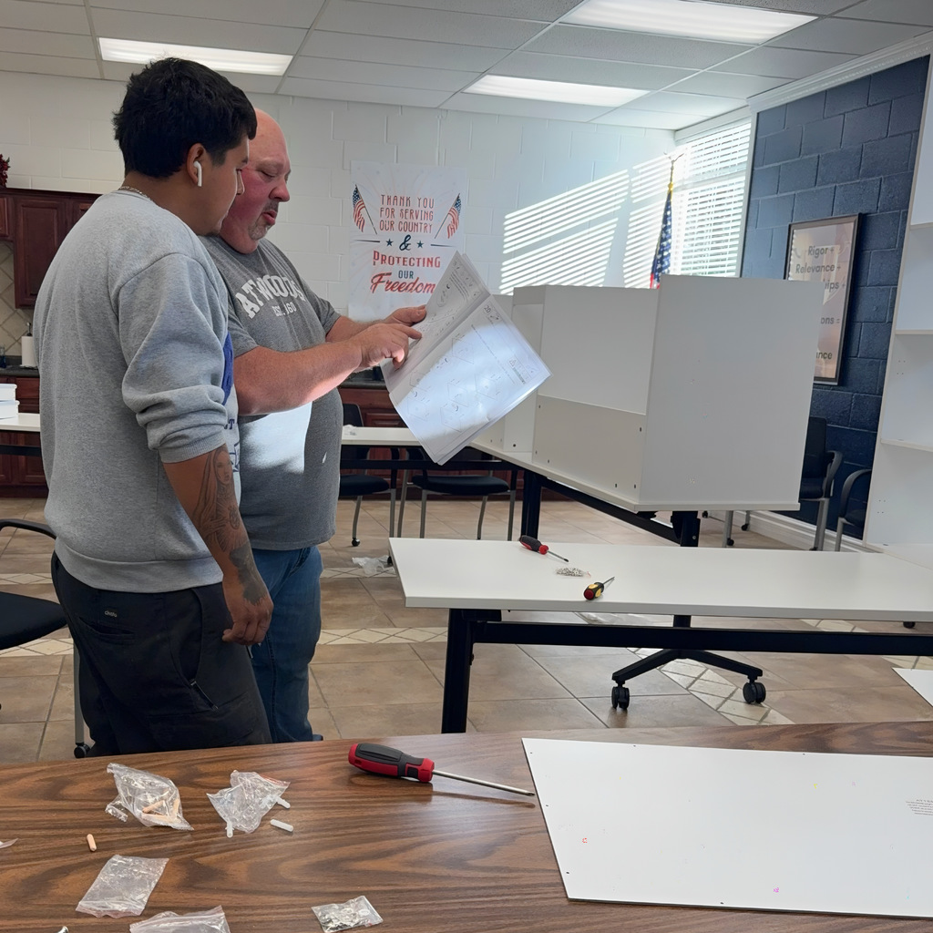 Lupe & Jeff putting a complicated desk