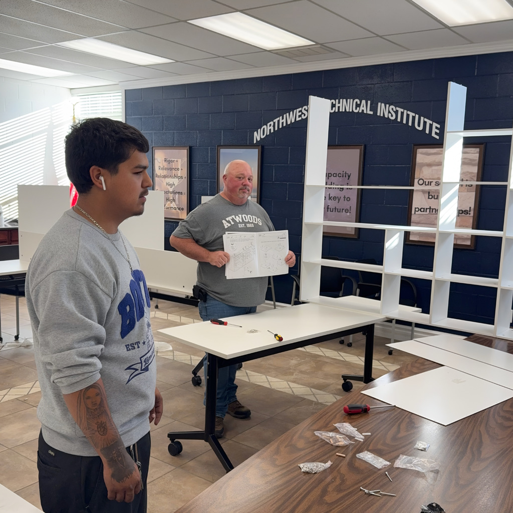 Lupe & Jeff putting a complicated desk