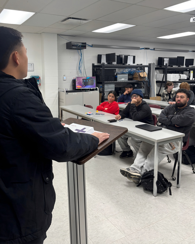 Recent NWTI graduate from our Information Systems program Timmy Xiong talks to current the NWTI I.S. class