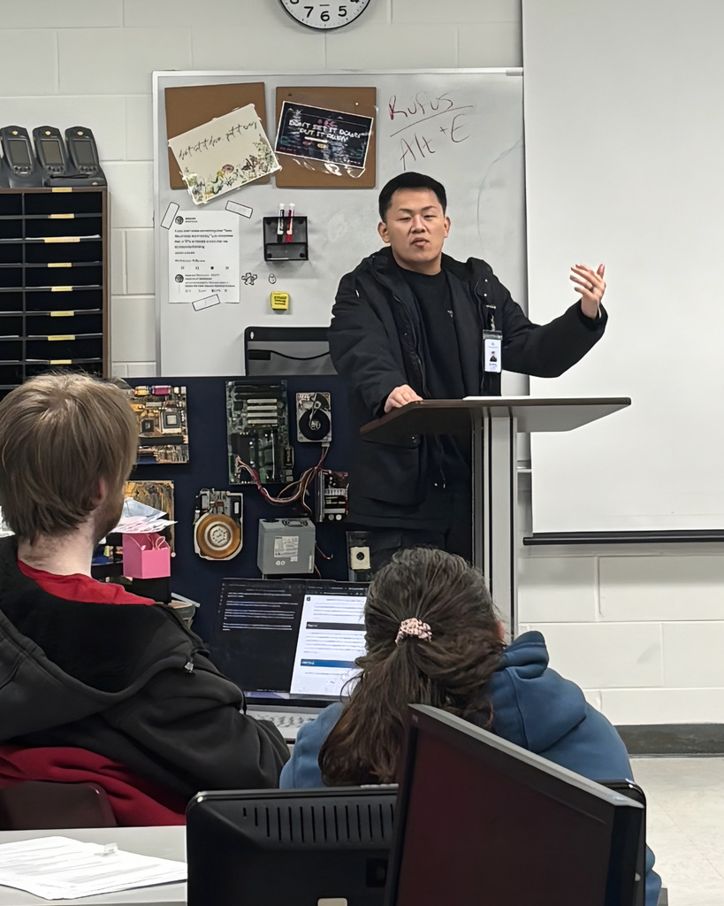 Recent NWTI graduate from our Information Systems program Timmy Xiong talks to current the NWTI I.S. class