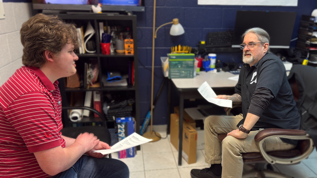 Information system students practice interviewing