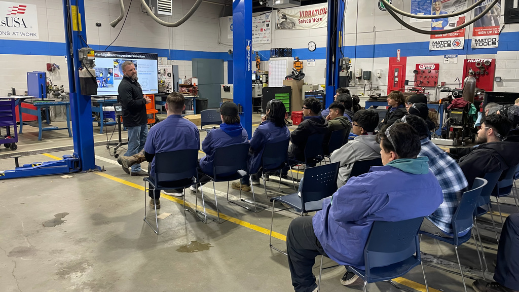 Bumper to Bumper makes a presentation to automotive students
