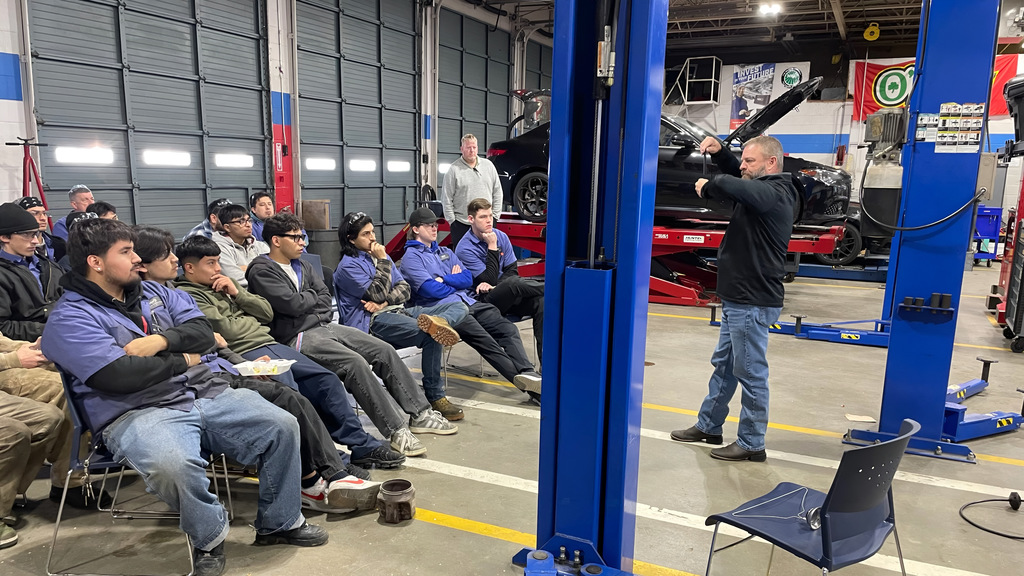 Bumper to Bumper makes a presentation to automotive students