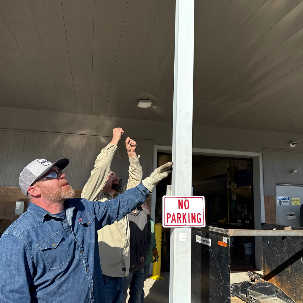 Welding students up on a crane
