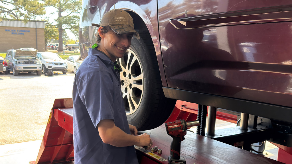 Automotive repair technology students with their projects. Thursday, April 9th.