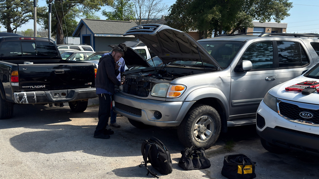Automotive repair technology students with their projects. Thursday, April 9th.