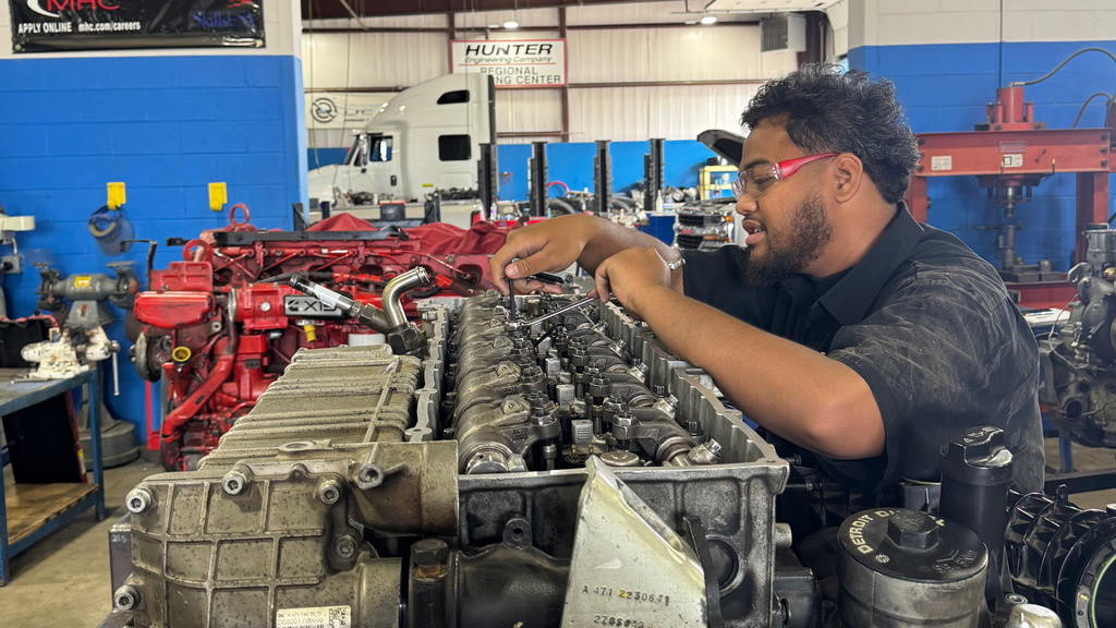 Diesel truck tech students junior class doing valve lash settings