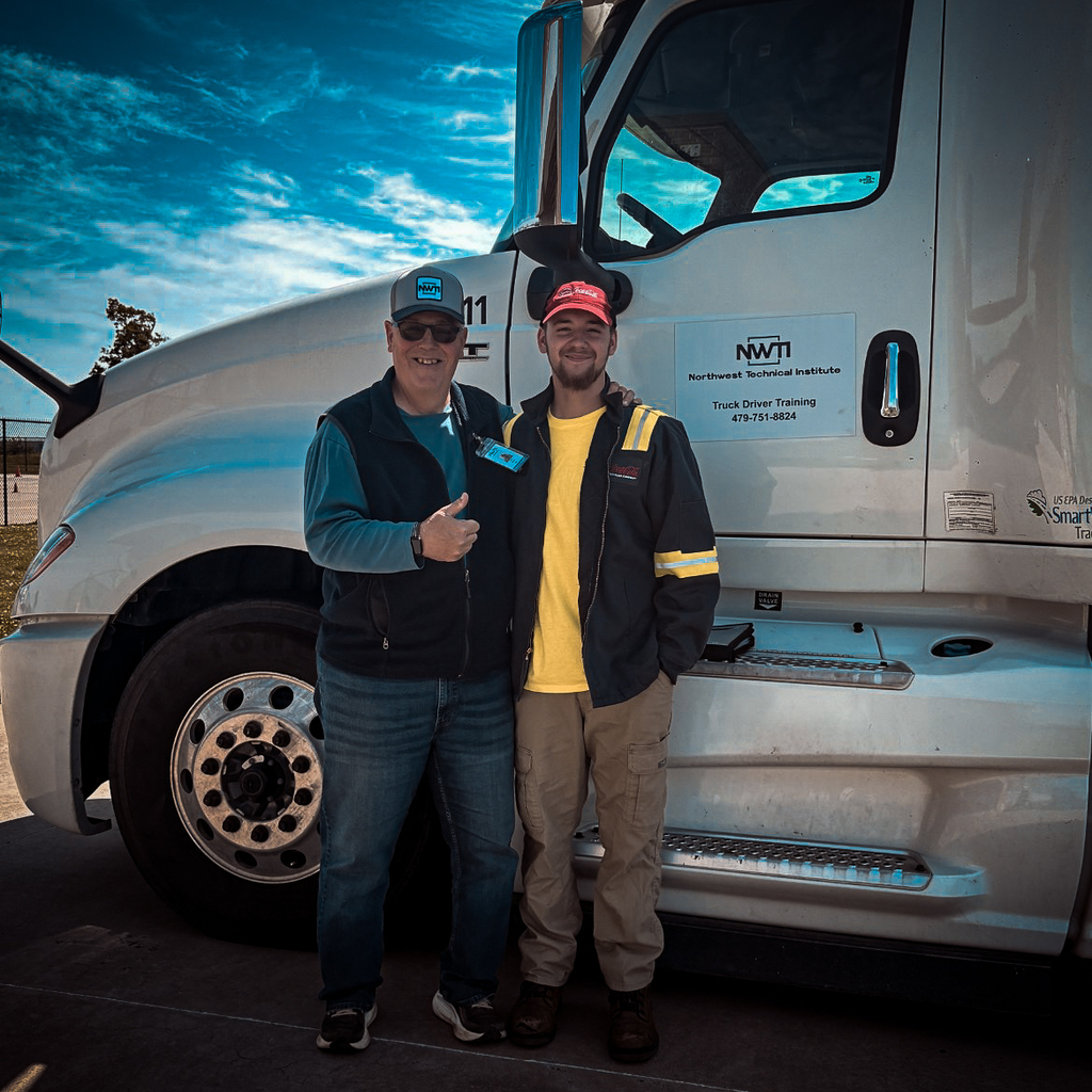 instructor jim morse and the latest CDL class graduate