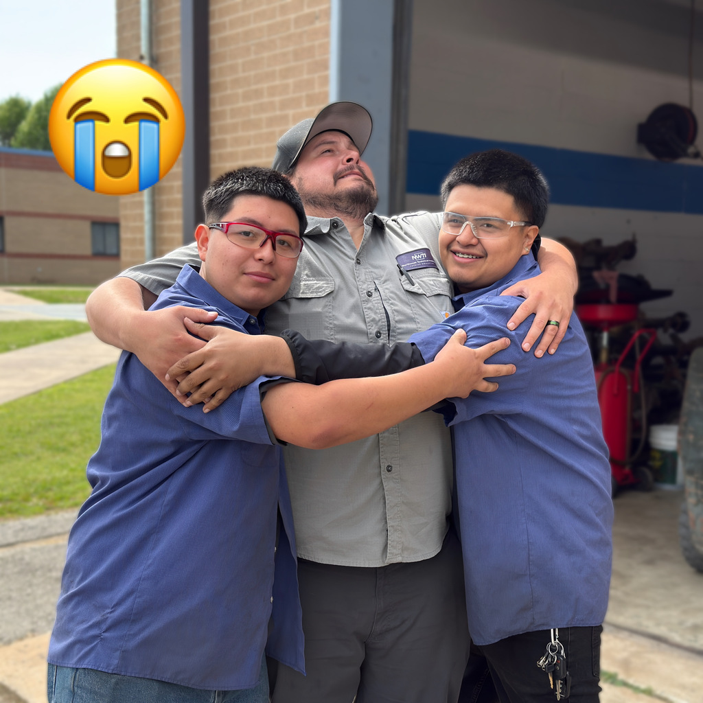 funny, two automotive students pictured with instructor nate despain
