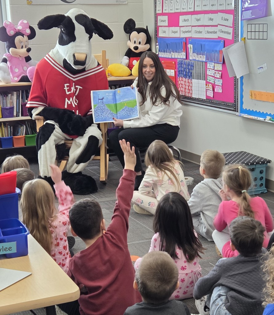 graphic image of cow reading to students
