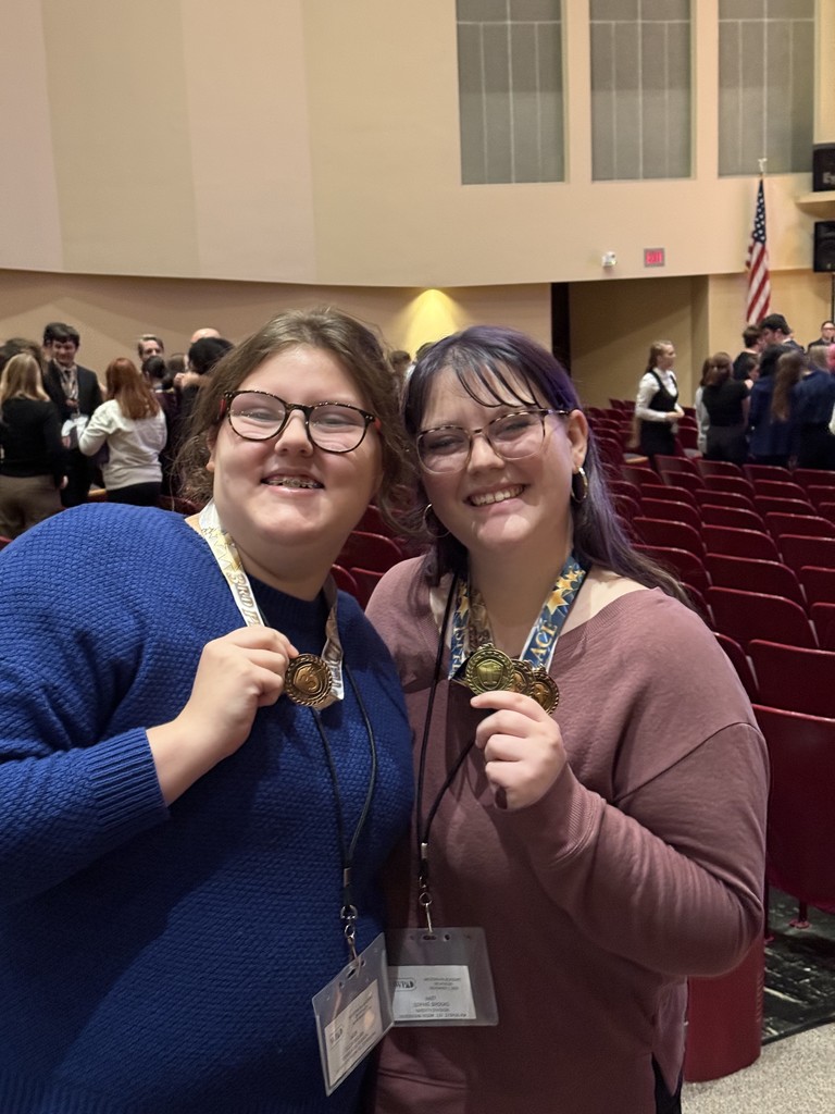 Ella Risjan and Sophie Brooks with their medals