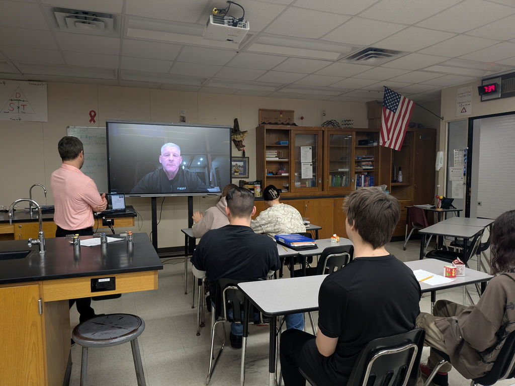 Students interacting with Special Agent Jason Wick