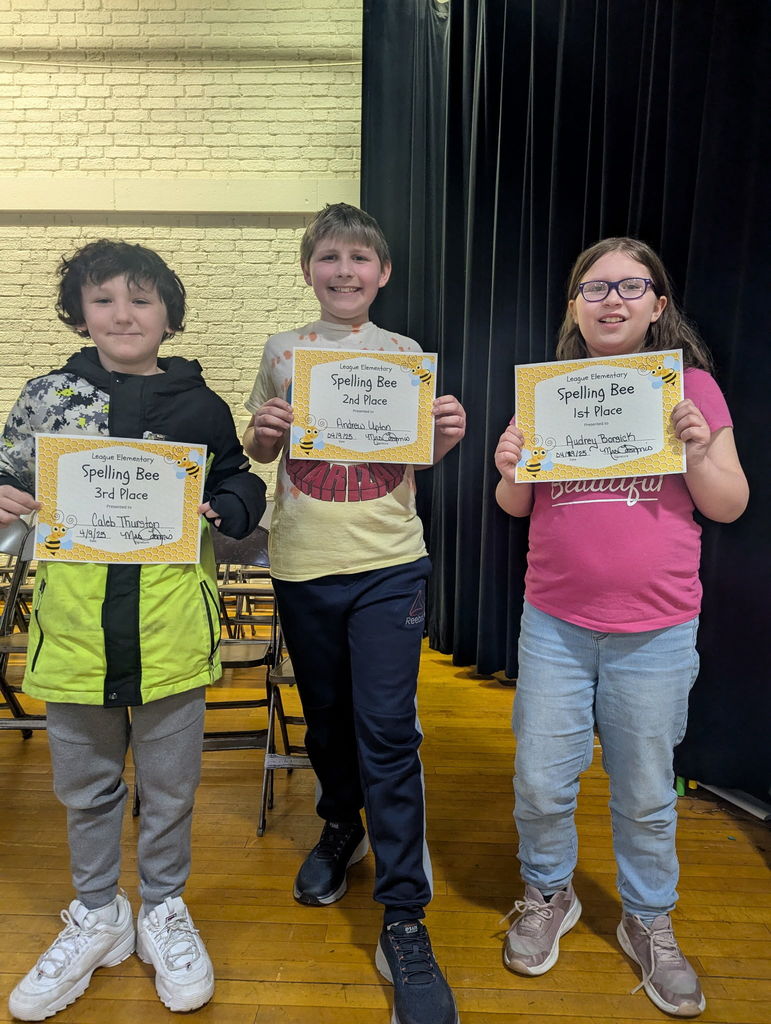 3 kids holding certificates