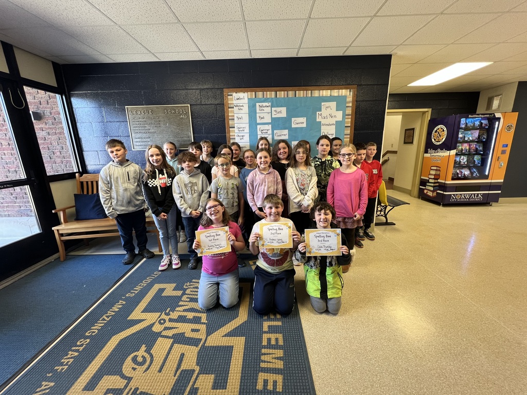 kids standing that participated in the spelling bee