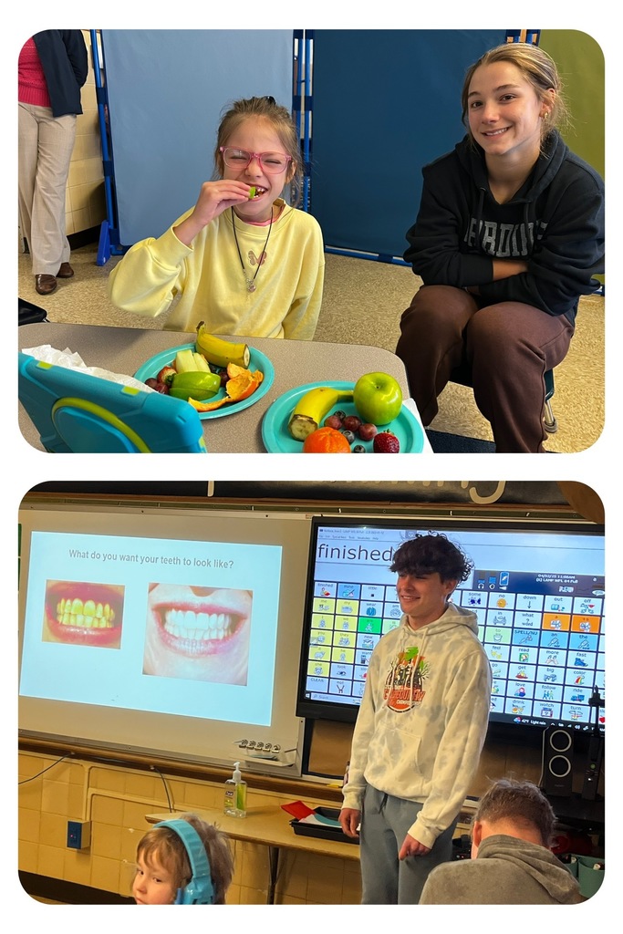 kids eating fruit and looking at teeth pictures