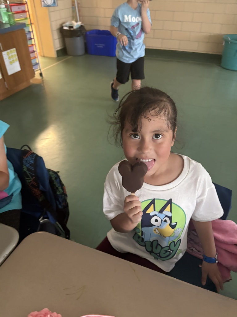 girl with mickey mouse ice cream