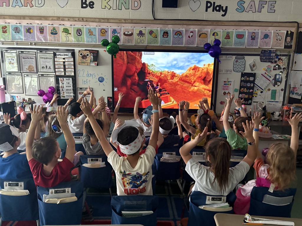 kids with hands in the air
