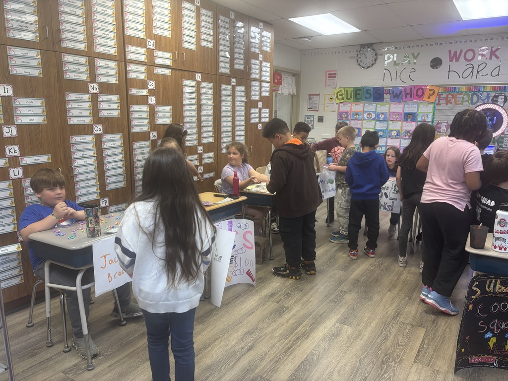 Students shopping in classroom