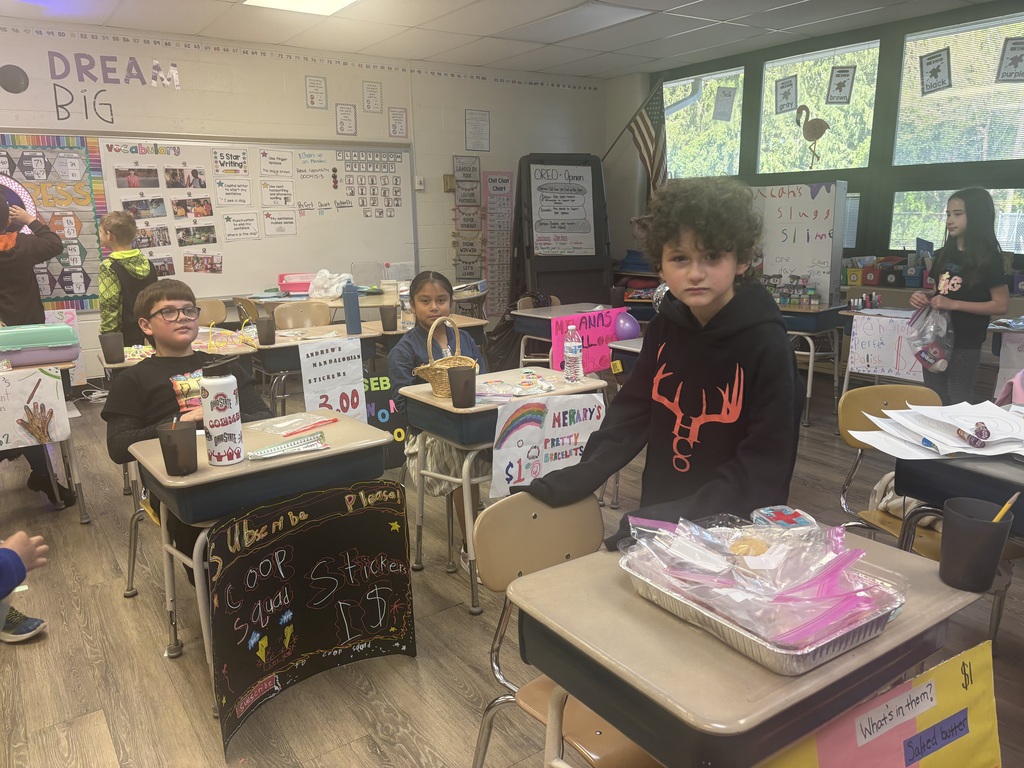 Students shopping in classroom