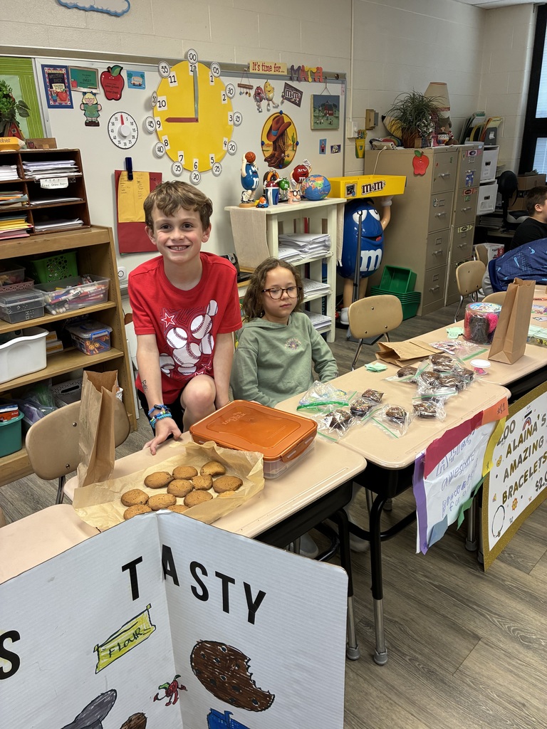 Students shopping in classroom