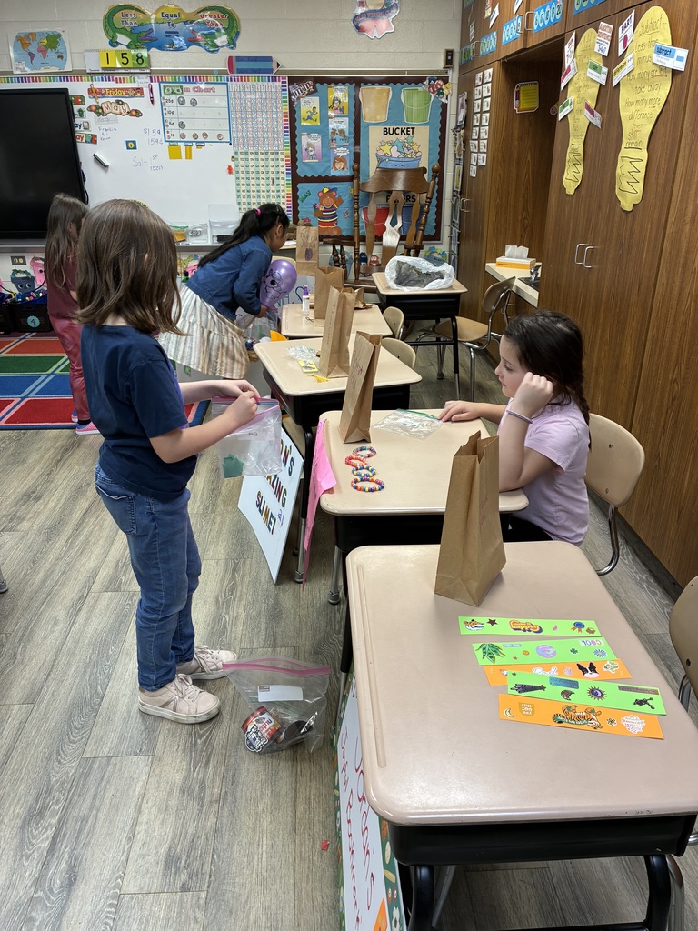 Students shopping in classroom