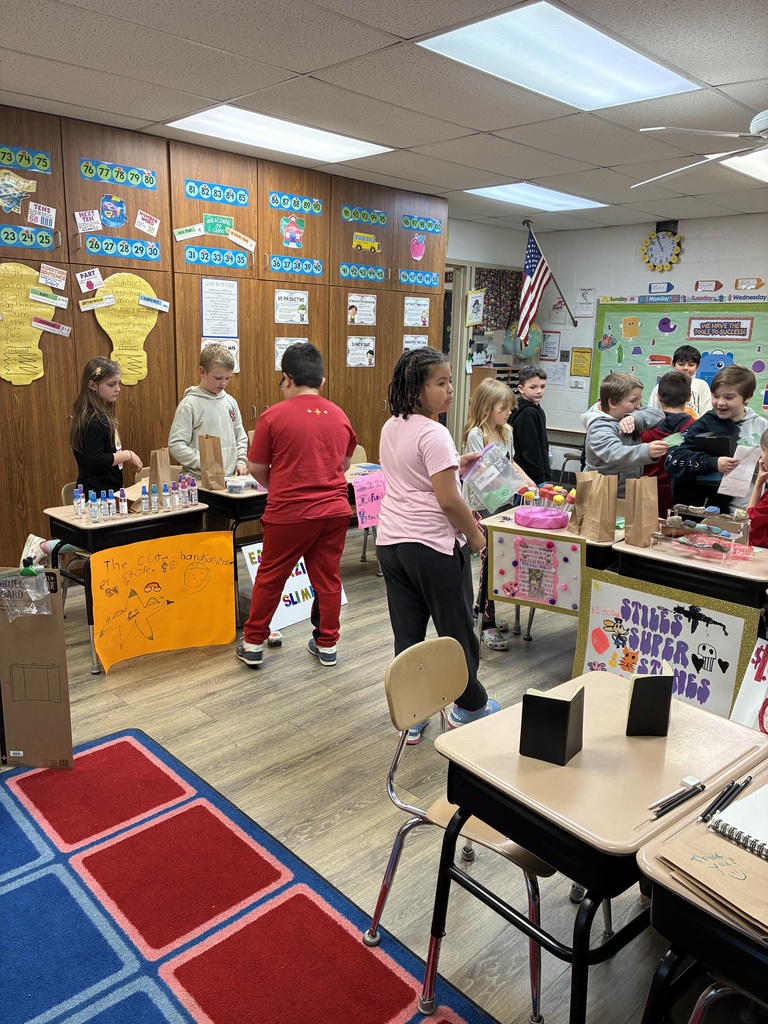 Students shopping in classroom