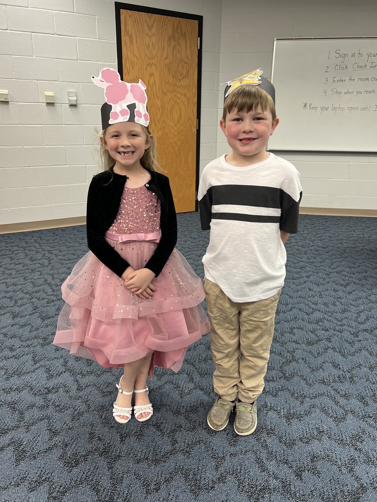 boy and girl with puppy hats
