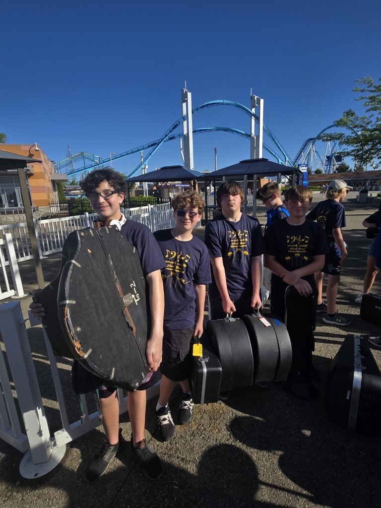 4 boys with instruments