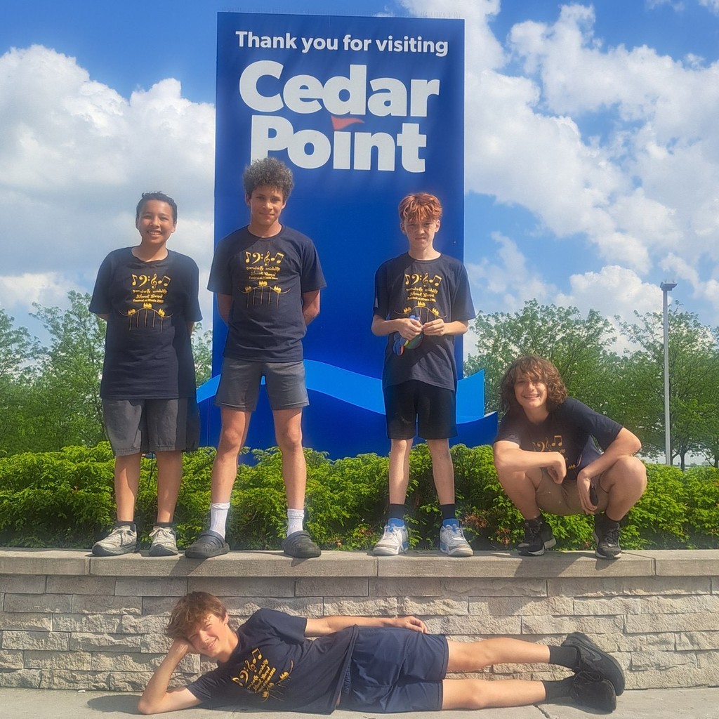 5 boys infront of Cedar Point sign