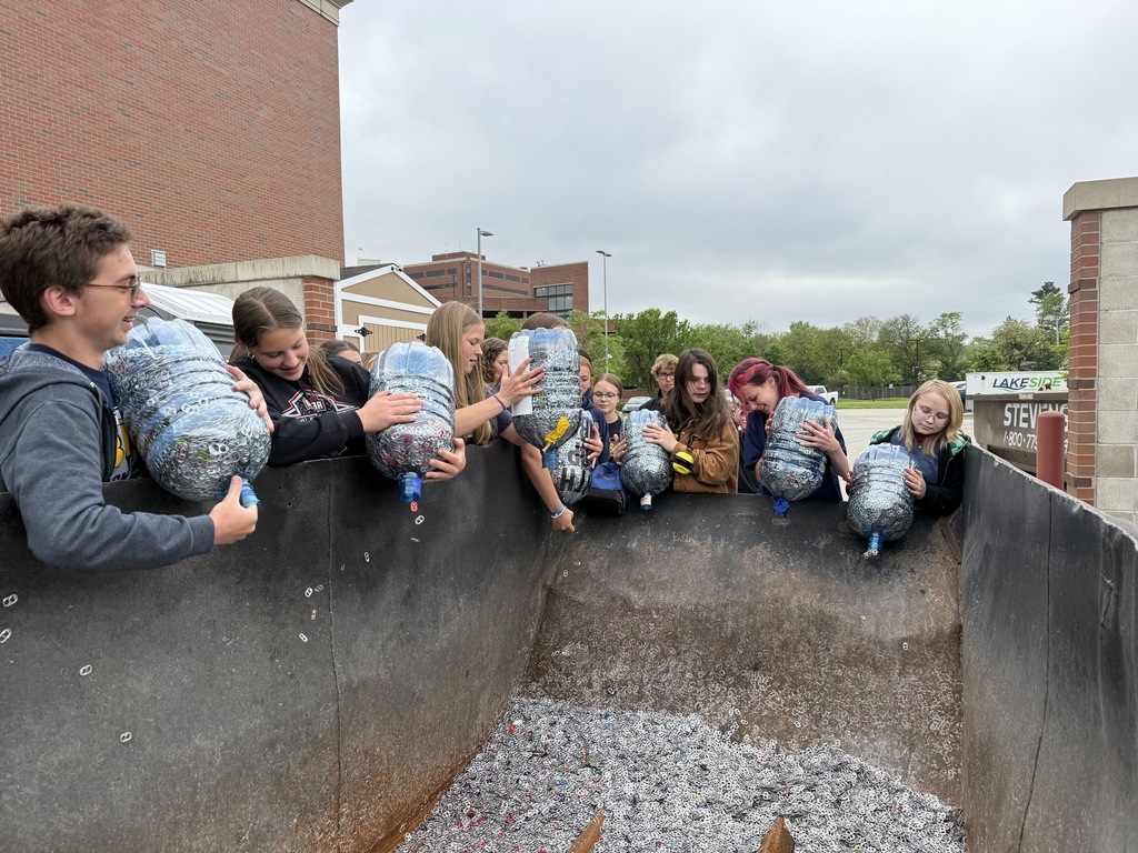 Kids by dumpster