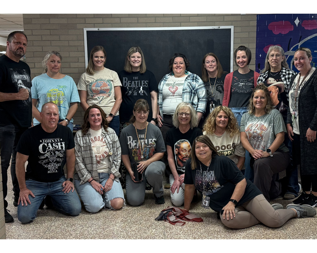 teachers in band t-shirts