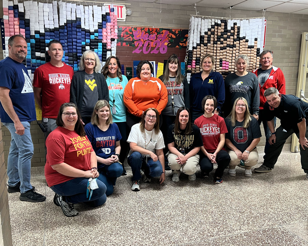 teachers in college shirts