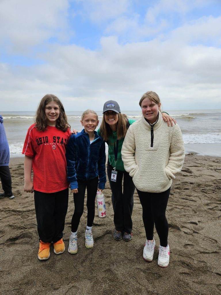 3 kids and teach in sand
