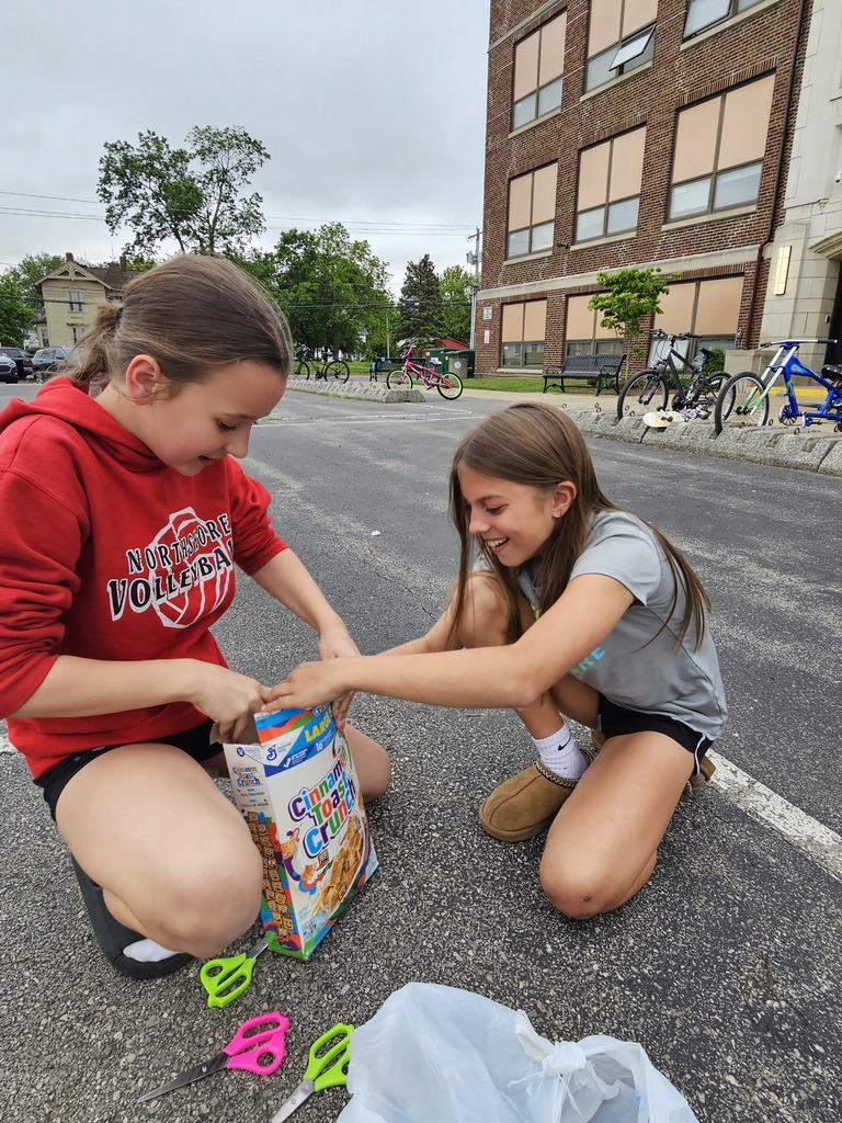 2 girls with cereal box