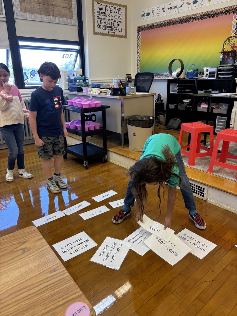Mrs. Baker’s class had relay races to practice standard form, expanded form, and word form.