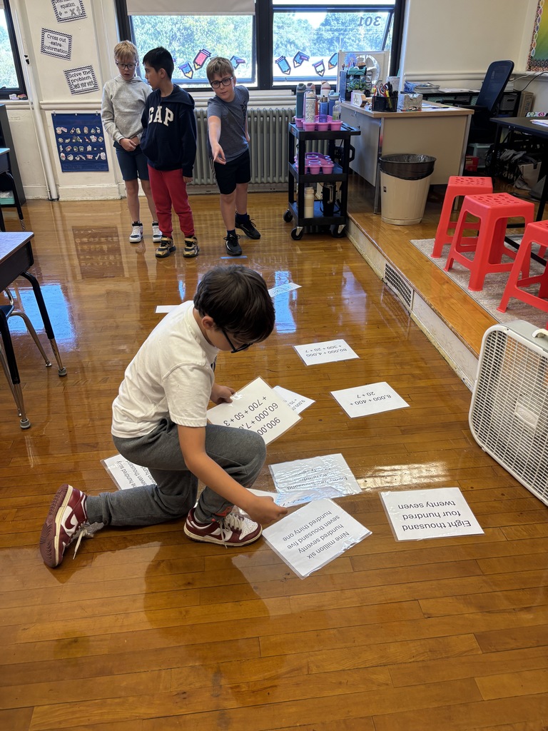 Mrs. Baker’s class had relay races to practice standard form, expanded form, and word form.