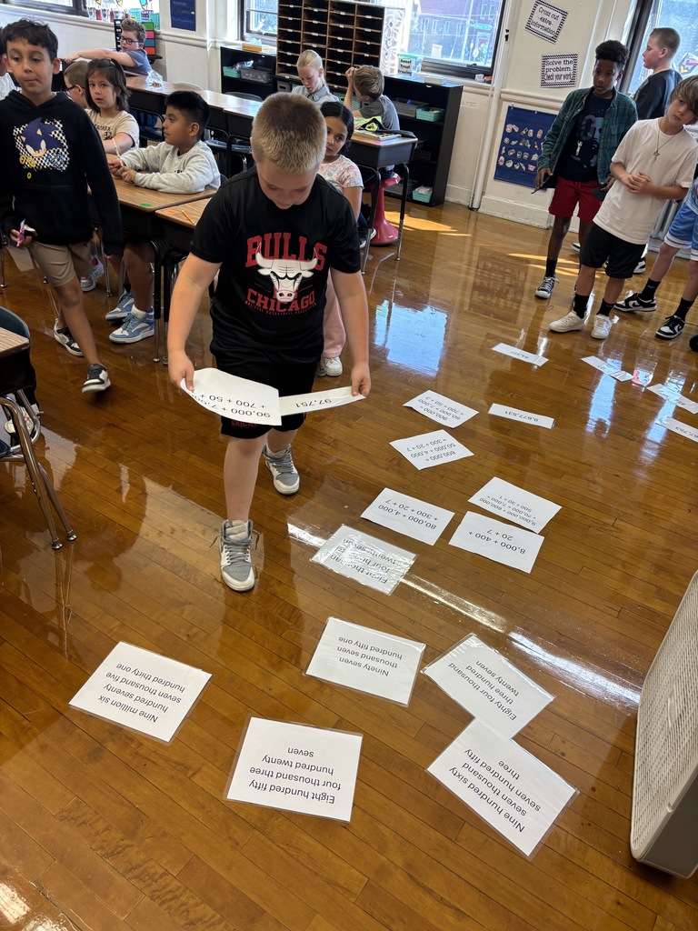 Mrs. Baker’s class had relay races to practice standard form, expanded form, and word form.