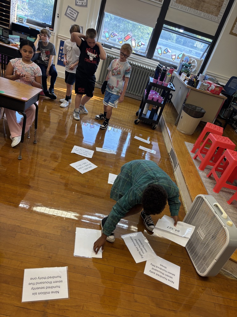 Mrs. Baker’s class had relay races to practice standard form, expanded form, and word form.