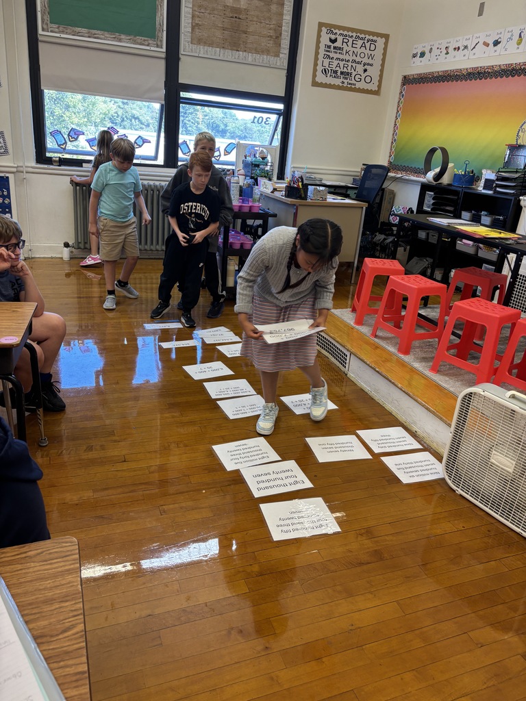 Mrs. Baker’s class had relay races to practice standard form, expanded form, and word form.
