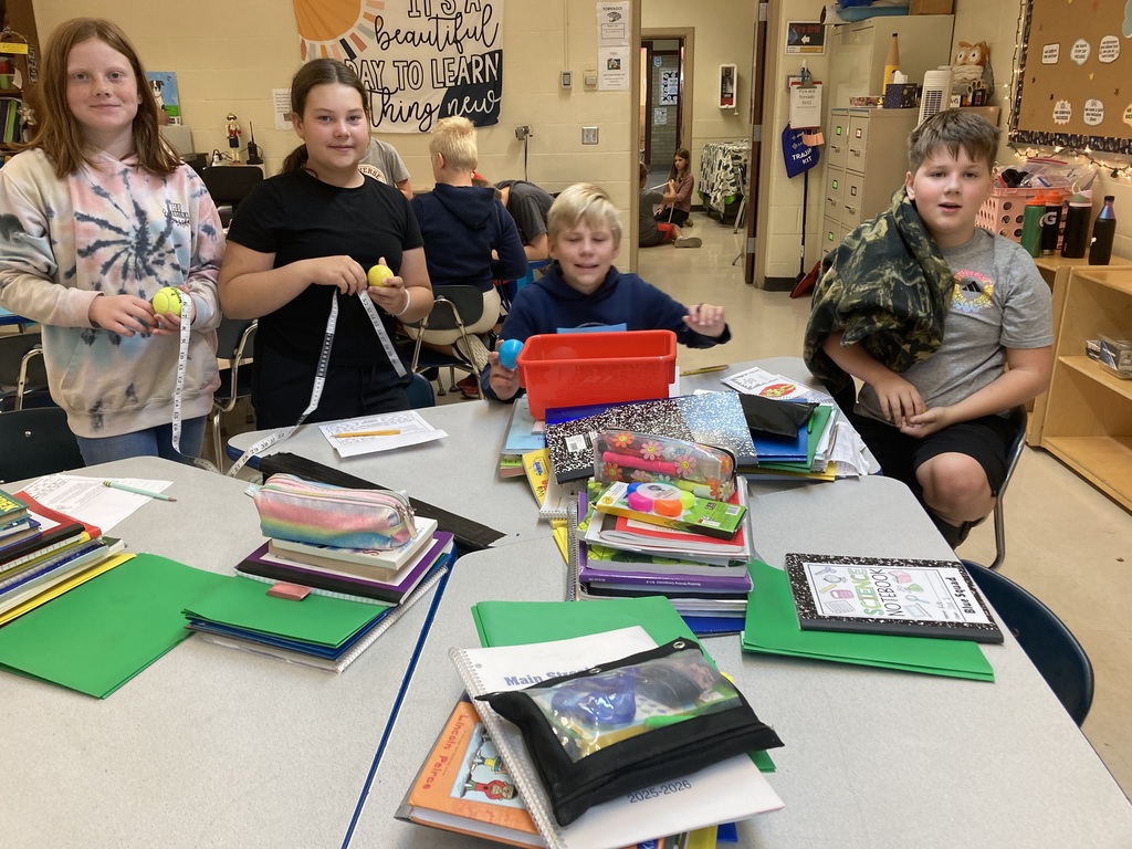 The 5th Grade Blue Scientists practiced their inquiry skills in science class. They explored like real scientists by observing objects closely, classifying them into groups, ordering them by different properties, and comparing the objects to notice similarities and differences.