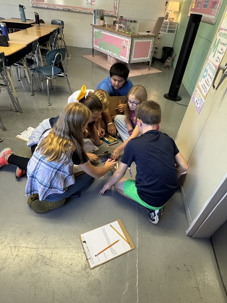 “Students in Mrs. Valentine’s science classes practiced using inquiry skills during a hands-on group activity. The skills they practiced were: observing, communicating, classifying, ordering, and comparing. They worked together to become super scientists!”