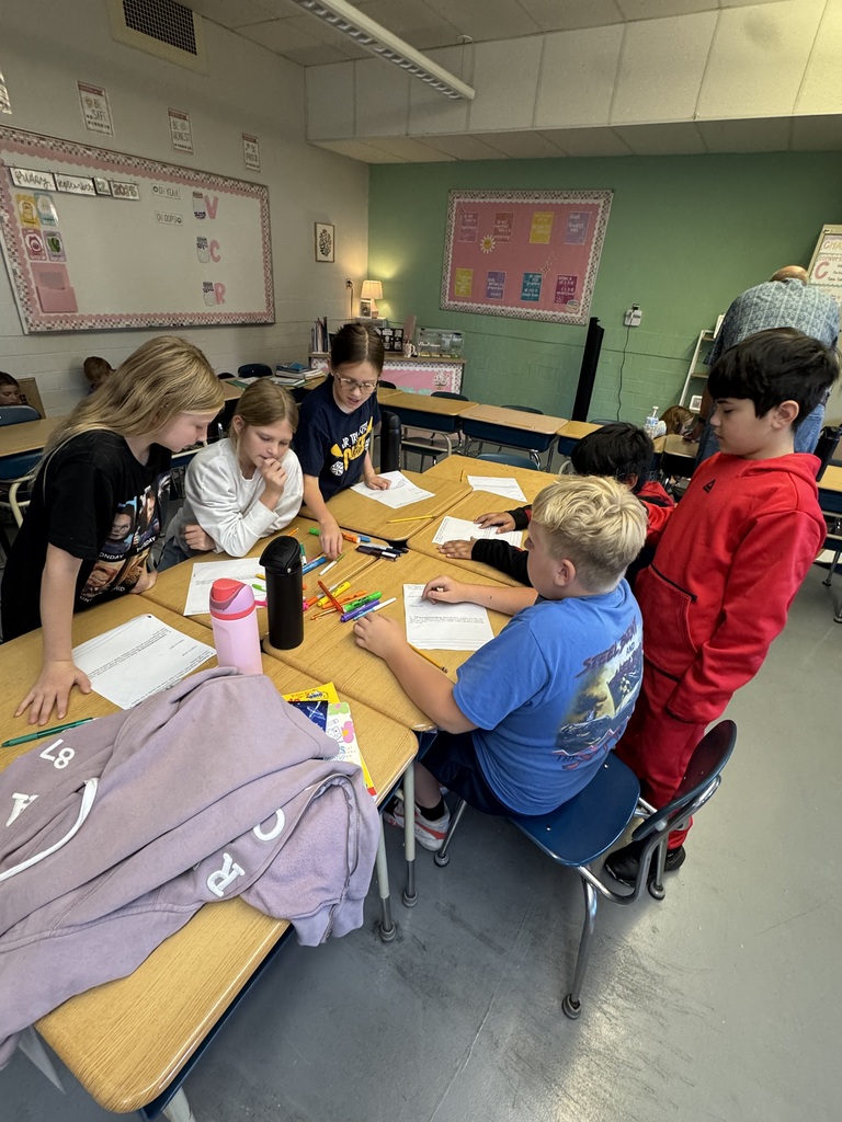 “Students in Mrs. Valentine’s science classes practiced using inquiry skills during a hands-on group activity. The skills they practiced were: observing, communicating, classifying, ordering, and comparing. They worked together to become super scientists!”