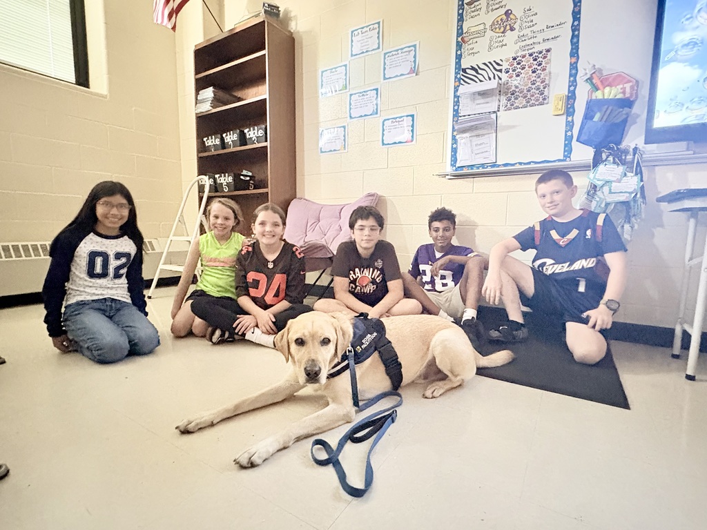 Kepler was all smiles today at Main Street seeing 4th and 5th grade staff and students sport their favorite team jerseys for Spirit Week!