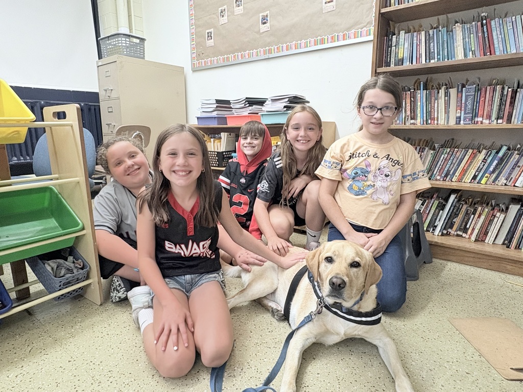Kepler was all smiles today at Main Street seeing 4th and 5th grade staff and students sport their favorite team jerseys for Spirit Week!